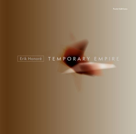 Der Text "Erik Honoré TEMPORARY EMPIRE", "Punkt Editions". Unscharfe, abstrakte Form vor braunem Hintergrund.