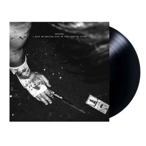 Text: "mclusky i sure am getting sick of this bowling alley". Schwarzes Vinyl, blutige Hand hält Messer.