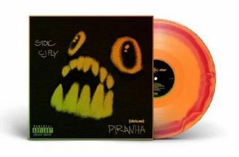Text: "STOP CJ FLY", "PIRANHA", "Deluxe", "Parental Advisory". 
Illustration: Ein fischähnliches Wesen mit großen Augen. 
Vinyl: Orange und pink.