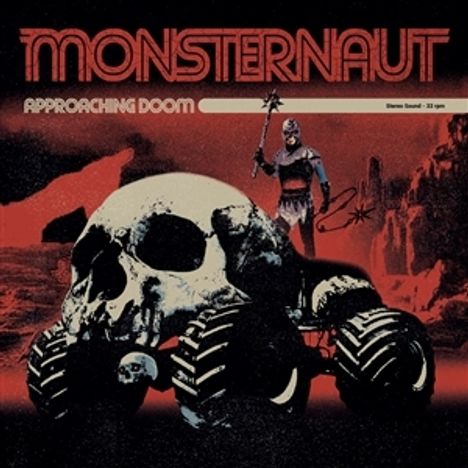 Text: "MONSTERNAUT" und "APPROACHING DOOM". Illustration: Ein Schädelgebilde auf Rädern mit einem Krieger im Hintergrund.