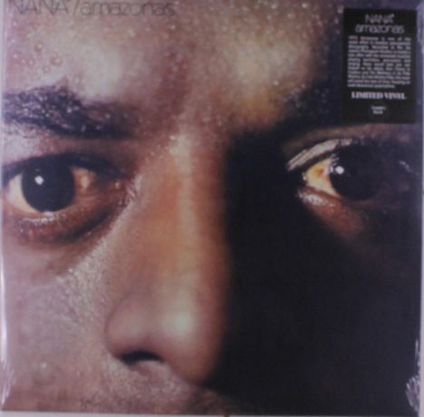 Texte: "NANA / amazônas", "LIMITED VINYL". Nahaufnahme eines Gesichts mit fokussiertem Blick, Wassertropfen sichtbar.