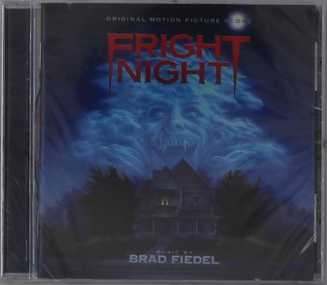 "FRIGHT NIGHT" in rot, darüber "Original Motion Picture Score". Unten "Music by BRAD FIEDEL". Eine unheimliche Wolkenfigur über einem Haus.