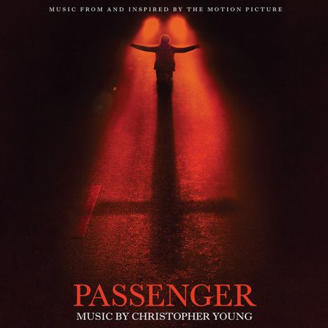 "Music from and inspired by the motion picture", "Passenger", "Music by Christopher Young".  
Kind in rotem Scheinwerferlicht auf Straße.