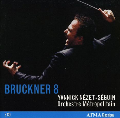 Text: Bruckner 8, Yannick Nézet-Séguin, Orchestre Métropolitain. Ein Dirigent in Aktion mit erhobenen Armen und Taktstock.
