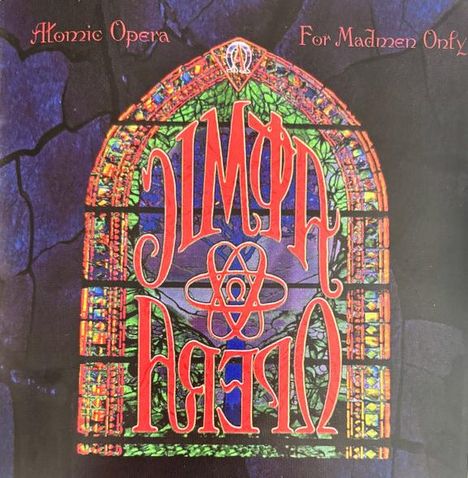 "Atomic Opera For Madmen Only" in gotischer Schrift, bunte Fensterrosenform, lebendige Farben.