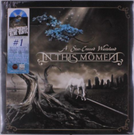 Text: "A Star-Crossed Wasteland" und "In This Moment". 

Illustration: Ein weißes Pferd wandert in einer öden, düsteren Landschaft, unter einem blauen Baum.
