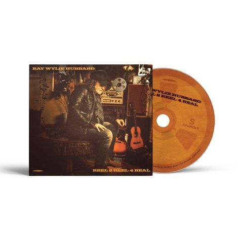CD-Cover und Disc mit Text: "RAY WYLIE HUBBARD", "REEL 2 REEL 4 REAL". Person sitzt neben Musikinstrumenten.