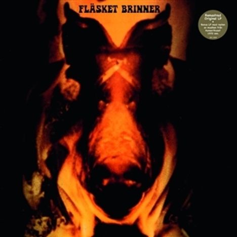 Text: "Fläsket Brinner". Ein spiegelbildliches, abstraktes Bild eines Tieres dominiert die Mitte.