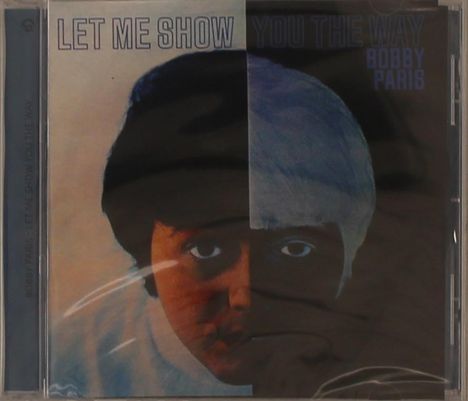 "LET ME SHOW YOU THE WAY" steht oben. "BOBBY PARIS" rechts in blau. Gesicht mit hellem und dunklem Farbkontrast.