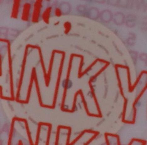 Roter Text "ANKY", darunter eine angedeutete Kreisform im Hintergrund.