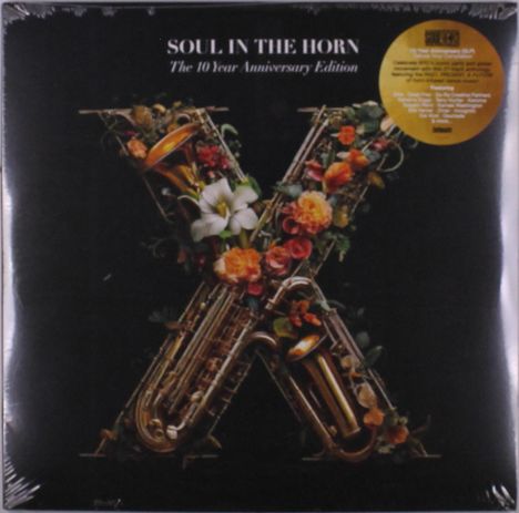 "SOUL IN THE HORN: The 10 Year Anniversary Edition" steht über einem X aus Blasinstrumenten und Blumen.