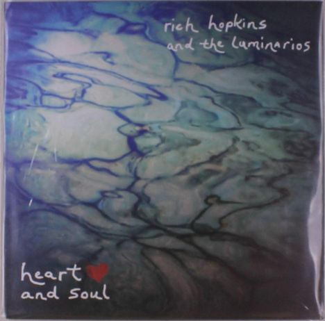 „rich hopkins and the luminarios“ oben, „heart and soul“ mit rotem Herz unten, Hintergrund: abstrakte blaue Muster.