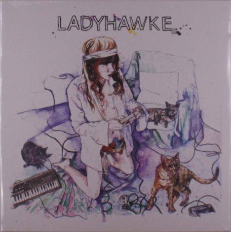 "LADYHAWKE" steht über einer Frau mit Stirnband, die kniet und ein Videospiel spielt, umgeben von Katzen.