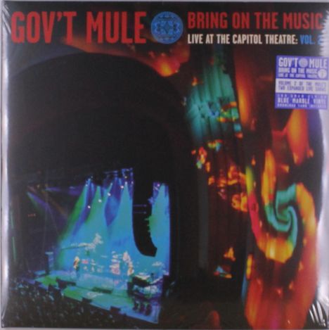 "Gov't Mule - Bring On the Music: Live at the Capitol Theatre: Vol." beleuchtete Bühne, bunte Lichter und Schatten.
