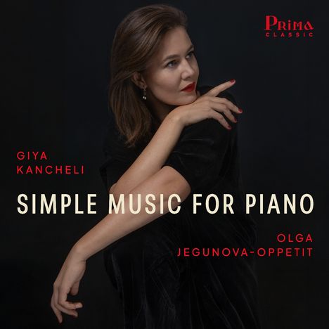 Giya Kancheli - SIMPLE MUSIC FOR PIANO. Olga Jegunova-Oppetit. Frau in elegantem Schwarz vor dunklem Hintergrund.