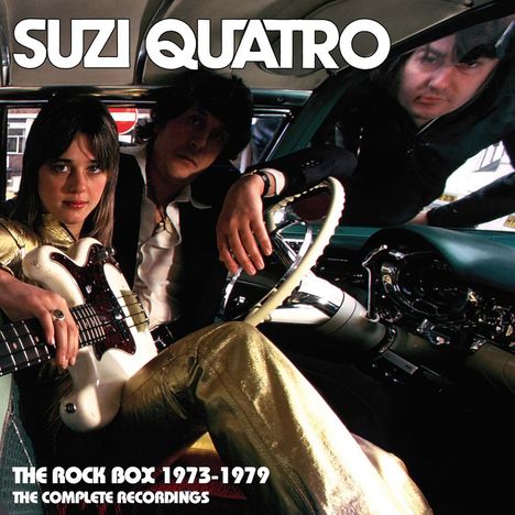 "SUZI QUATRO", "THE ROCK BOX 1973-1979", "THE COMPLETE RECORDINGS". Zwei Personen in einem Auto mit Instrument.