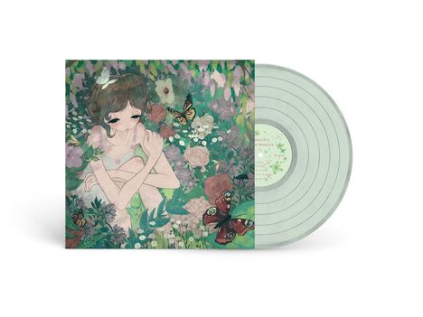 Text: "mamachii mami mania 33rpm."  
Illustration: Ein Mädchen umgeben von Blumen und Schmetterlingen.