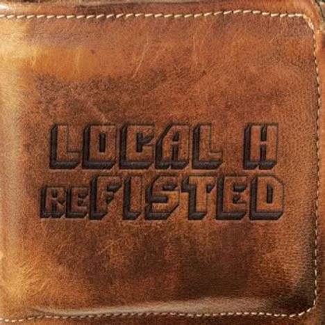 Text: "LOCAL H REFI$TED" in dunkler Schrift auf einer braunen, lederähnlichen Oberfläche.