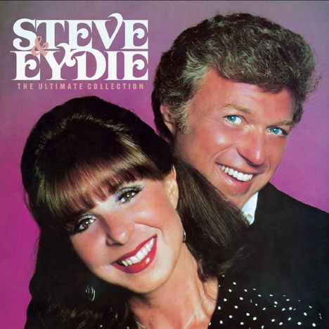 Oben steht "STEVE & EYDIE: THE ULTIMATE COLLECTION". Zwei lächelnde Personen vor pinkem Hintergrund.