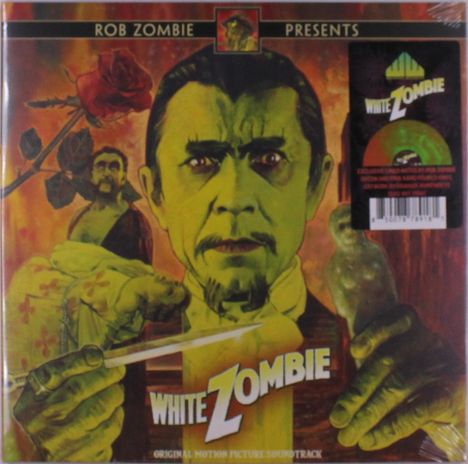 "Rob Zombie presents White Zombie." Grüne Person mit strenger Miene, Vogel auf der Hand, Rose im Hintergrund, retro Stil.