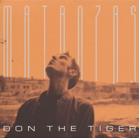"Matanzas" steht oben in langen Buchstaben. Unten: "Don the Tiger". Ein Mann schaut nach oben, der Hintergrund ist unscharf.