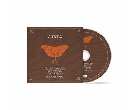Text: "Aurora", "All my demons greeting me as a friend", "The Moth Tapes". CD und Hülle mit orangefarbener Motte.
