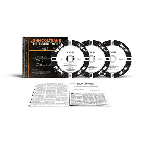 Box-Set mit "JOHN COLTRANE THE TIBERI TAPES" auf der Verpackung. Drei CDs und ein offenes Booklet sind sichtbar.