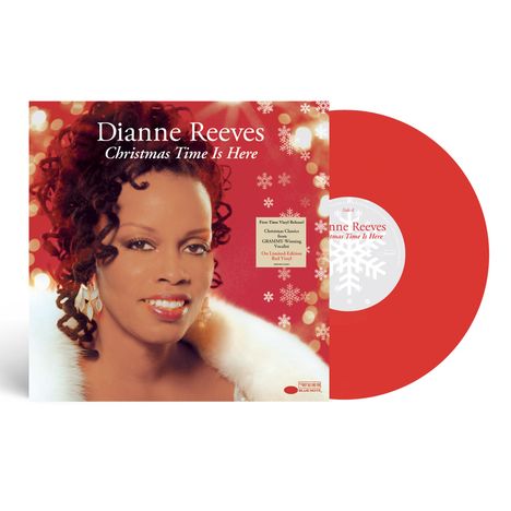 „Dianne Reeves - Christmas Time Is Here“ steht groß auf dem Cover. Es zeigt eine Frau in festlicher Kleidung.
