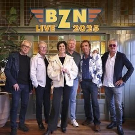 Text: "BZN LIVE 2025". Sechs Personen stehen nebeneinander vor einer dekorativen Wand.