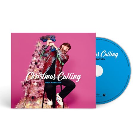"Christmas Calling", Rea Garvey. Person mit Gitarre und pinkem Weihnachtsbaum auf pinkem Hintergrund. CD daneben.