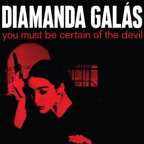 "DIAMANDA GALÁS" in Weiß oben, "you must be certain of the devil" in Rot darunter. Eine Frau mit schwarzem Haar hält einen Revolver.