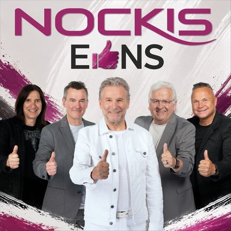 Text: "NOCKIS E1NS" mit Daumen-hoch-Symbol. Fünf Männer in Anzügen lächeln, Hintergrund in lila und schwarz.
