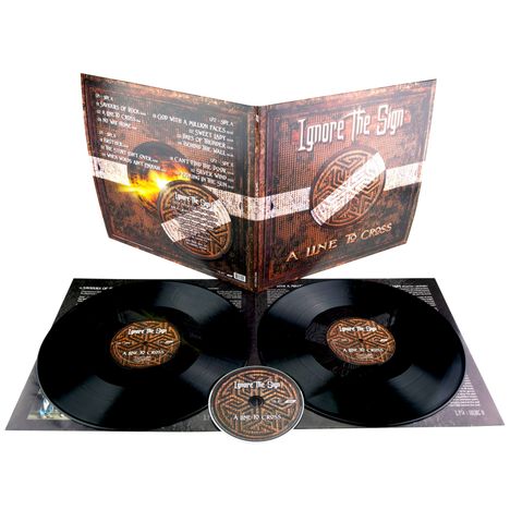 "Ignore The Sign" und "A Line To Cross" auf einem Schallplatten-Cover. Zwei schwarze Schallplatten und eine CD sind sichtbar.