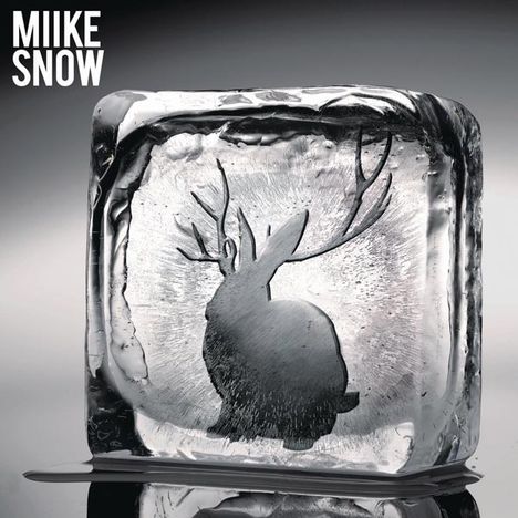 Oben links steht "MIIKE SNOW". Ein Eiswürfel mit der Silhouette eines Hasen mit Geweih ist zu sehen.