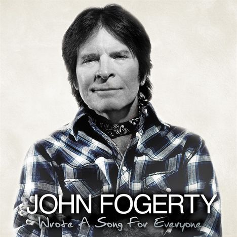 "JOHN FOGERTY - Wrote A Song For Everyone". Ein Mann in kariertem Hemd, Bandana um den Hals, schaut freundlich.