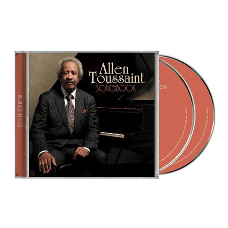 "Allen Toussaint Songbook, Deluxe Edition." Ein Mann in einem Anzug sitzt vor einem Flügel auf einem CD-Cover.
