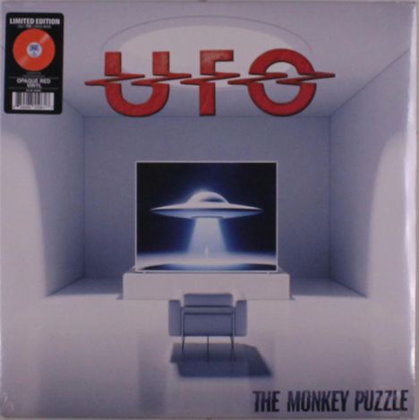 Text: „LIMITED EDITION“, „OPAQUE RED VINYL“, „UFO“, „THE MONKEY PUZZLE“. Illustration eines UFOs schwebend mit Lichtstrahl.