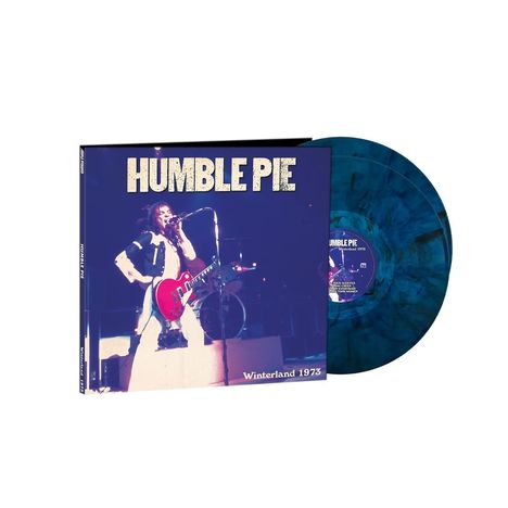 Text: "HUMBLE PIE", "Winterland 1973". Albumcover mit blau gemusterter Vinyl-Schallplatte, Musiker mit roter Gitarre.
