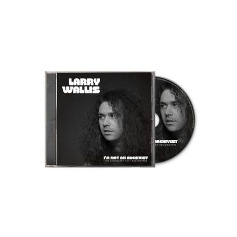 Der Text lautet: "LARRY WALLIS" und "I'M NOT AN ARCHIVIST - THE LEGENDARY LOST RECORDINGS". Cover zeigt einen Mann mit langen Haaren.