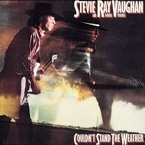 "Stevie Ray Vaughan and Double Trouble Couldn't Stand the Weather." Ein Mann mit Gitarre vor stürmischem Hintergrund.
