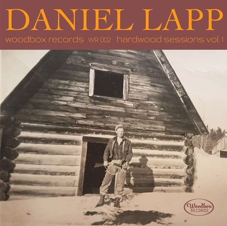 "DANIEL LAPP", "woodbox records WR 002 hardwood sessions vol. 1". Eine historische Hütte aus Holz mit einer Person davor.