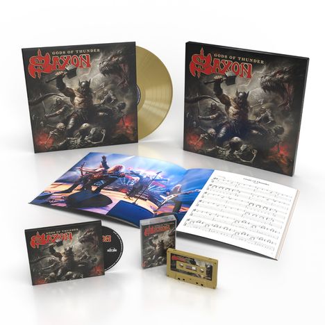 Cover mit "Gods of Thunder" und "Saxon". Enthält LP, CD, Kassette, Notenblatt und Konzertfoto. Illustration mit Krieger.