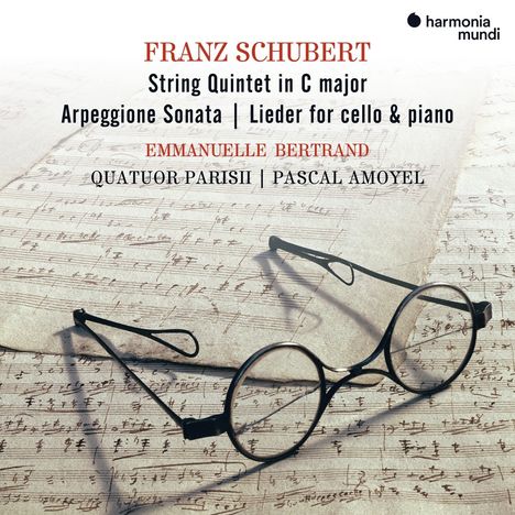 Oben Text "FRANZ SCHUBERT". Eine Brille liegt auf alten, handschriftlichen Notenblättern, neben Logo "harmonia mundi".