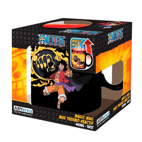 "ONE PIECE" und "MAGIC MUG" sind sichtbar. Ein Charakter mit Feuerfaust ist abgebildet. Verpackung mit Aufdruck.
