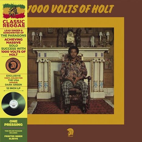 "1000 Volts of Holt" steht oben. Links ein "Classic Reggae" Banner, unten ein "One Pressing" Hinweis. Ein Mann sitzt vor Kamin.