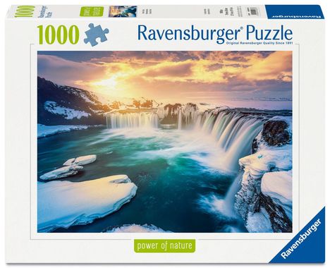 "Ravensburger Puzzle", "1000", "power of nature". Es zeigt einen beeindruckenden Wasserfall im Winter bei Sonnenaufgang.
