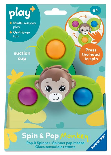 Texte: "play+", "Multi-sensory play", "Press the head to spin", "Spin & Pop Monkey". Kinderspielzeug mit Affenkopf.