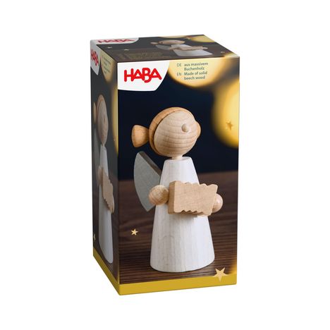 "HABA, aus massivem Buchenholz. Ein stehender Holzengel mit Flügeln und einem Instrument auf einer Verpackung."