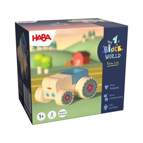 "HABA", "My 1st Block World", "Farm Life", "1+", "2 PCS", "Made in Germany". Holzspielzeug-Traktor, Landschaft im Hintergrund.