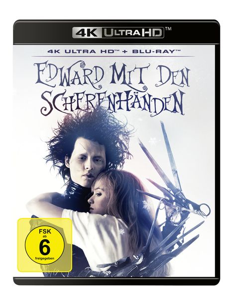 "FSK ab 6 freigegeben." "Edward mit den Scherenhänden." Ein Mann mit Scherenhänden umarmt eine Frau.